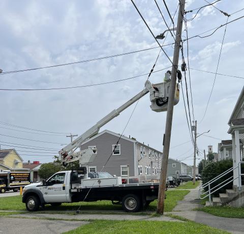 bucket truck and pole with wires