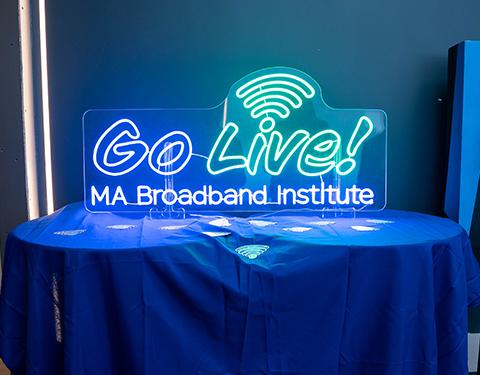 Go Live neon sign at the 2025 MA Goes DigitALL event